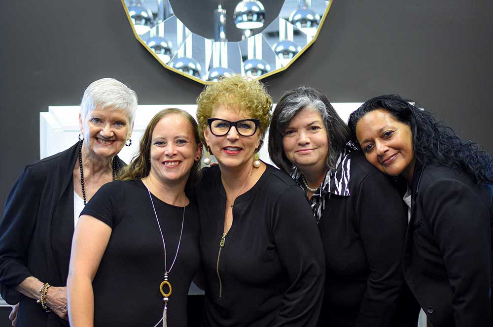 photo of Attorney Angela Davis-Morris with the firm's legal team.
